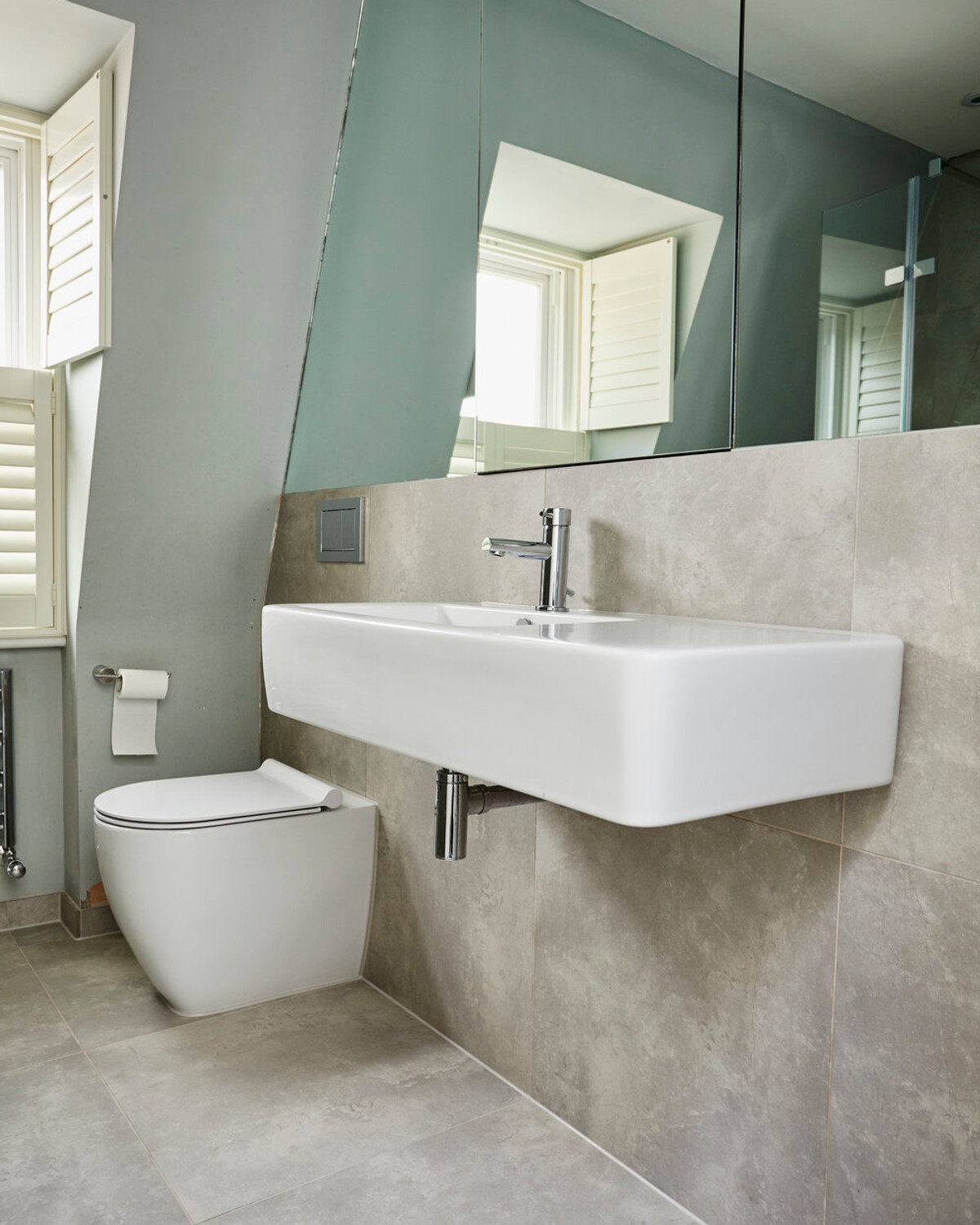 Contemporary completed bathroom with grey tiling
